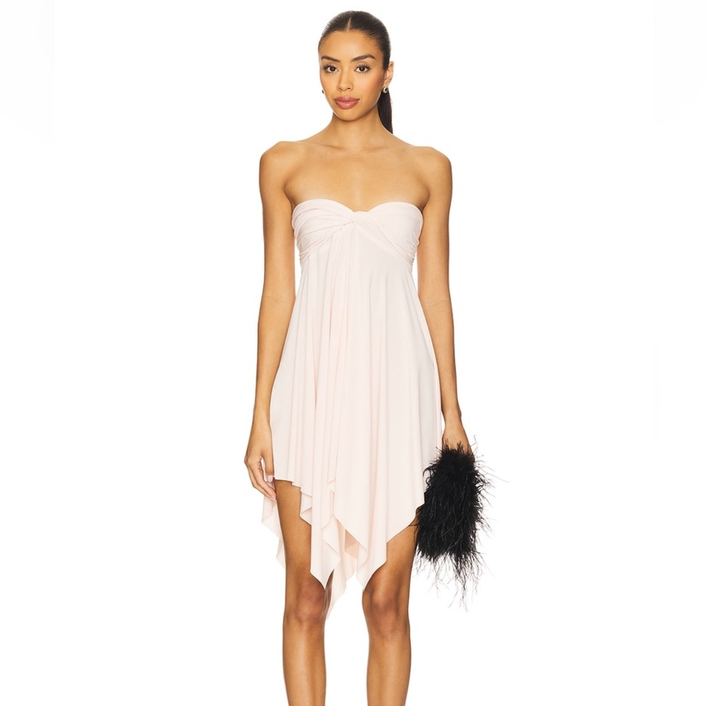 Norma Kamali CONVERTIBLE MINI 
In pink size m
